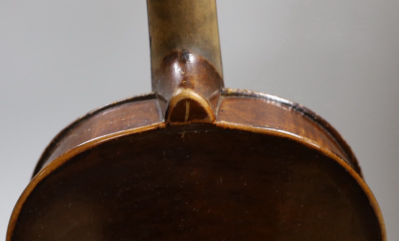 A Maidstone violin, with bow, cased. violin 59 cms high.